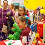 Girl laughing at Wellsville event